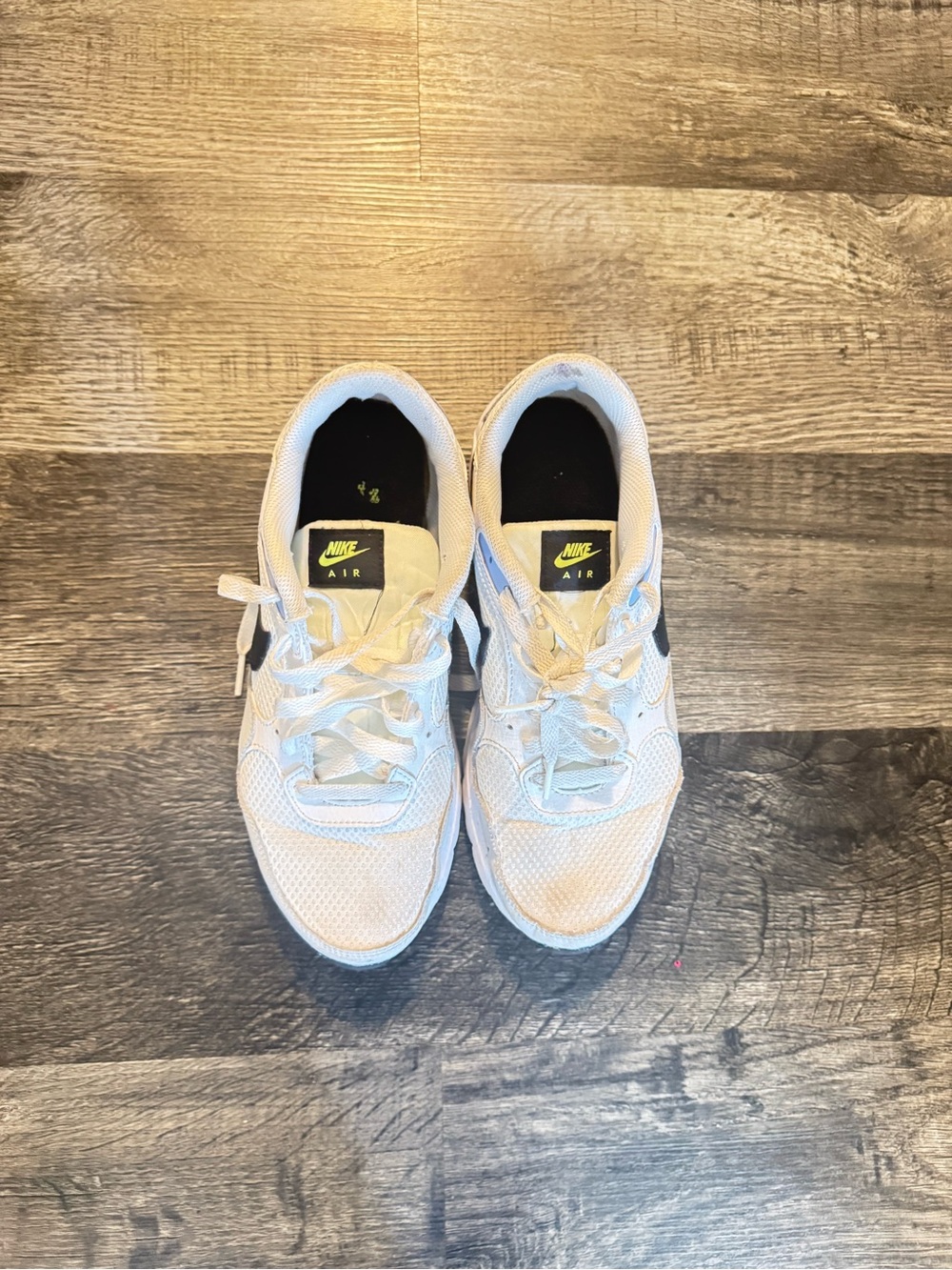 Nike White Sneakers with Black Tag and Lime Green Logo